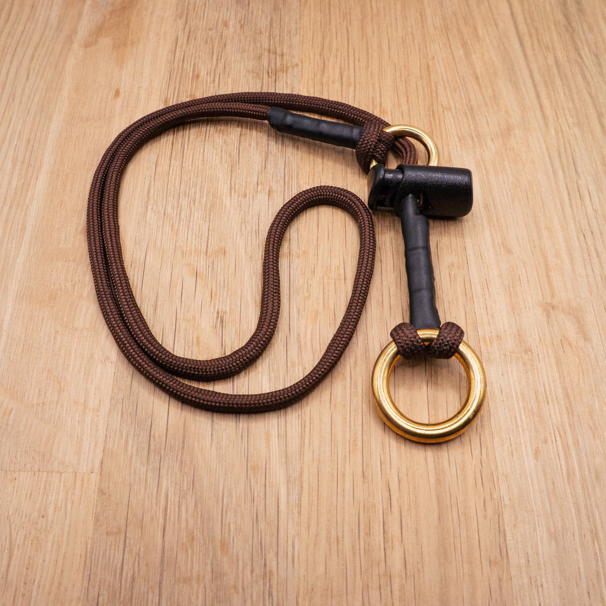 Slip collar featuring solid brass O ring, Paracord 550 type 3 in Brown colour. 