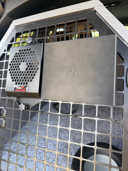 A black storage box attached to a Trans K9 crate